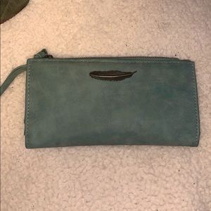 Sapphire blue wallet with feather detail